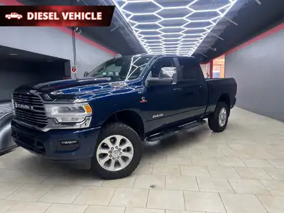 The 2023 Ram 3500 Laramie in dynamic Blue drives with confidence with its 44 drivetrain, making it a...