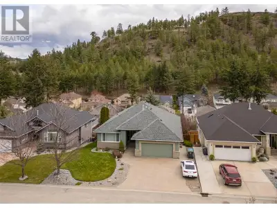 Welcome to this beautifully updated and spacious 5-bedroom rancher with a walkout basement in desira...