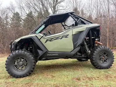 This RZR is a Beautiful Beast that works and looks like New It is a 925cc 181 Horse Power Turbo Auto...