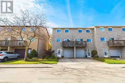 tunning end-unit townhouse located in the highly desirable Heritage Green neighborhood of Upper Ston...