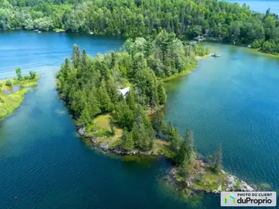 Traduction automatique Île Roddick - Retraite insulaire rustique sur le magnifique Grand Lac Rond !...