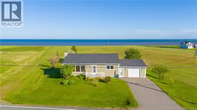 Beautiful waterfront view home in the Chiasson Office area. Situated on a spacious and beautifully l...