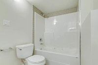 Amenities: In-suite Laundry • City Views • Affordable Parking Suite & Building: Three-bedroom townho... (image 7)