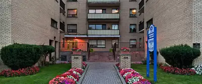 Building Information Blending uptown with downtown. A cute, well-kept mid-rise building, Suncrest Co...