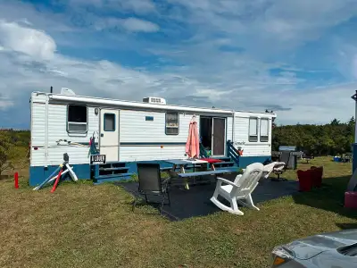 a louer pour tourist de partout a Grande-Anse NB 5 min de la plage et 15 min de Caraquet Nb ou sont...