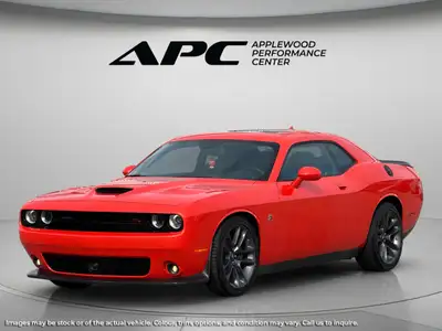 The 2023 Dodge Challenger Scat Pack 392 in a bold Orange finish with Rear-Wheel Drive is designed fo...