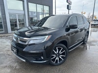 New Arrival! Drive home comfort, space, and reliability in this 2019 Honda Pilot Touring 8 Passenger... (image 2)