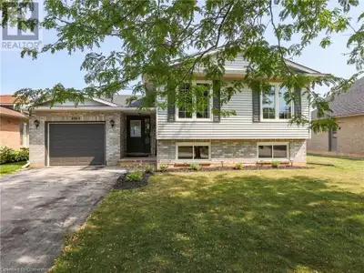 WHAT A GORGEOUS FULLY FINISHED HOME sitting on an oversized 65ft wide lot with in-law suite! Welcome...
