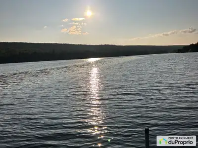 Magnifique terrain bord de l'eau, 318 pieds de façade au lac Mckanzie , 1,33 acres, à seulement 15 m...