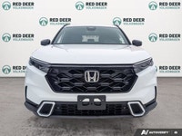 The 2024 Honda CR-V Hybrid Touring is a pre-owned compact SUV that emphasizes refined comfort, effic... (image 2)