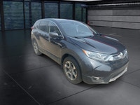 The 2018 Honda CR-V EX-L AWD in striking gray is the perfect blend of versatility and style, designe... (image 1)
