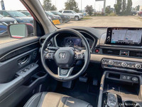 Experience the versatility and comfort of this 2023 Honda Pilot Touring SUV. Boasting a powerful eng... (image 9)