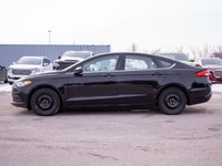 This 2017 Ford Fusion SE is powered by a reliable 2.5L four-cylinder engine paired with a smooth aut... (image 4)