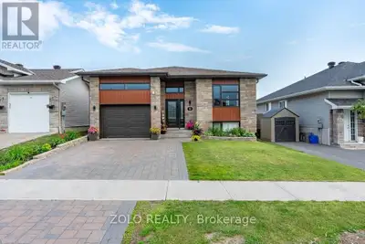 Beautifully designed raised bungalow located in a sought-after north-end neighbourhood, offering the...