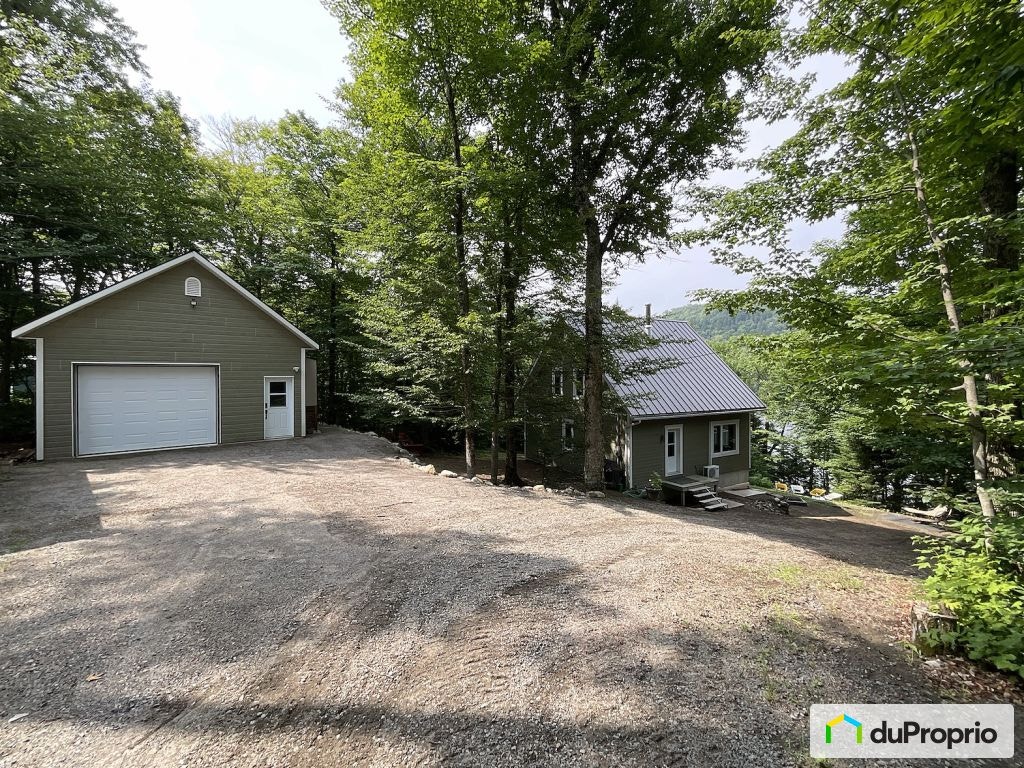 $750,000 - Cottage for sale in Grandes-Piles — photo 1