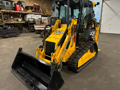 New - JCB 1CXT – Skid steer/Backhoe 110,000.00 Serial # 3361843 Comes with 4 in 1 front bucket and H...