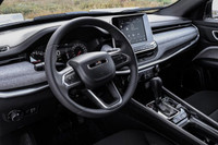 This Jeep Compass has a dependable Intercooled Turbo Regular Unleaded I-4 2.0 L/122 engine powering... (image 8)