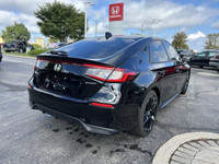 Experience the thrill of the 2025 Honda Civic Hatchback Sport, boasting a sleek Crystal Black Pearl... (image 4)