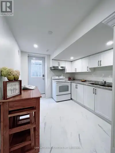 Newly renovated 1200 Square feet Furnished Basement Apartment, 3 bedrooms , 2 full bathrooms. 2 park...