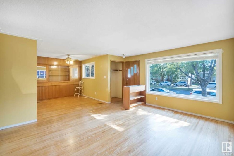 RAISED BUNGALOW with LEGAL SUITE with excellent access to NAIT