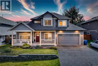 The quintessential north Nanaimo family home with room for everyone! This expansive property feature...