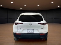 The 2022 Mazda CX-30 GT w/Turbo AWD in stunning white exudes confidence and offers a smooth handling... (image 6)