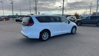 This 2023 Chrysler Pacifica Touring FWD has the V6 3.6L erc - Gas engine with a 9 Speed Automatic tr... (image 4)