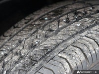 Command the urban landscape with the striking 2025 Cadillac XT4 AWD Sport, featuring the distinctive... (image 9)