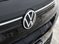 The 2025 Volkswagen ID.4 Pro AWD in striking Deep Black Pearl stands as a beacon of modern engineeri... (image 9)