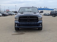 The pre-owned 2021 Ram 1500 Classic Express Crew Cab in Patriot Blue Pearl with a Black and Diesel G... (image 9)