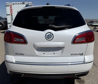 Enjoy class and comfort in a WHITE Buick Enclave. Buick introduced the Enclave at the 2006 Detroit A... (image 3)