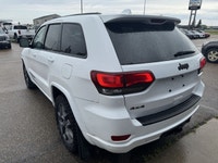 Our exclusive 2021 Jeep Grand Cherokee Limited 4X4 wraps assertive capability in a dramatic Bright W... (image 2)