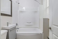 Amenities: Heat & Water Included • Large Windows • Quiet Building Suite & Building: Spacious bachelo... (image 8)