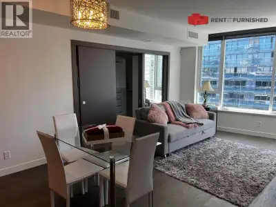 Experience the best of downtown living in this furnished penthouse condo at the prestigious One Paci...