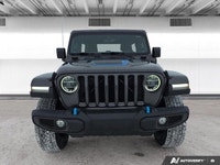 This *2021 Jeep Wrangler 4xe Unlimited Rubicon* combines legendary off-road capability with modern p... (image 8)