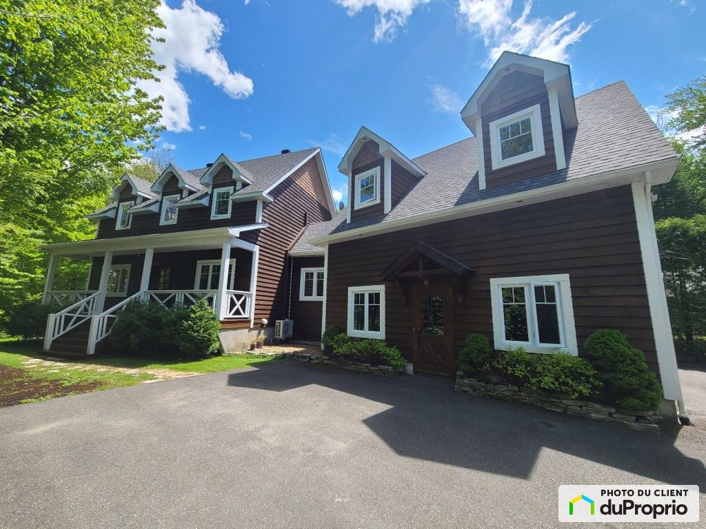 $998,500 - 2 Storey for sale in Ste-Anne-Des-Lacs — photo 1