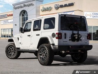 This Jeep Wrangler has a dependable Regular Unleaded V-6 3.6 L/220 engine powering this Automatic tr... (image 4)