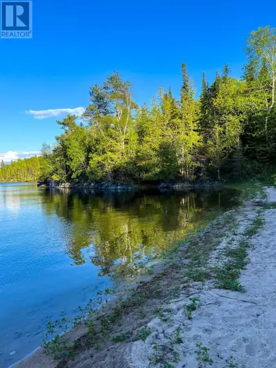 **30.5-Acre Waterfront Retreat on Needle Point – Sunrise Views, Privacy & Endless Possibilities** Ex...