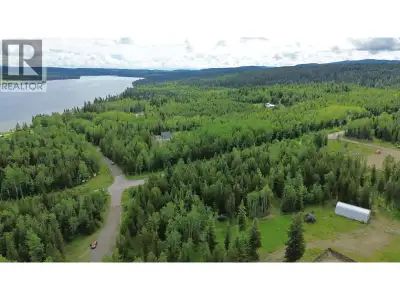 Big Lake is calling! Only seconds from the lake, this level and fully treed 3 acre lot is primed for...
