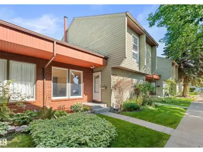 Updated & immaculately maintained, second-owner townhouse BACKING A FIELD! Tucked away on a quiet st...
