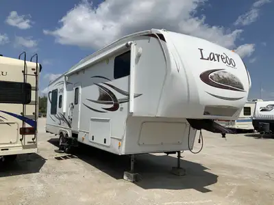2011 Keystone Laredo 316RL Overview This spacious fifth wheel is perfect for seasonal living or exte...