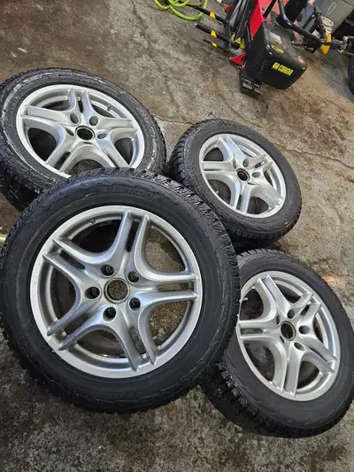 Original Porsche Cayenne wheels with TPMS mounted on Hankook winter tires. Wheels: 18x8 Offset: 57 B...