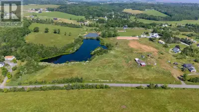 Newly surveyed 49,000+ sq ft building lot has easy access to the 101 Highway at Exit 8 approx. 1km a...