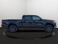 Experience dependable power and rugged capability with this 2023 Toyota Tacoma Base V6. As a leader... (image 6)