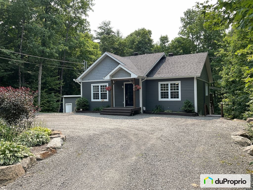 $610,000 - Bungalow for sale in Ste-Sophie — photo 1