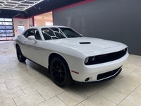 Experience the thrill of driving the 2020 Dodge Challenger SXT in stunning White. This RWD coupe bri... (image 2)