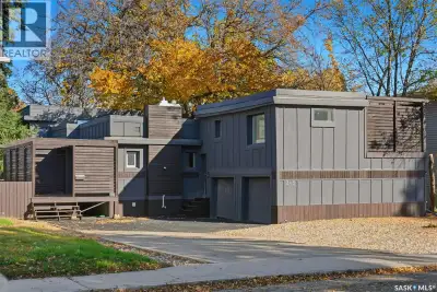 This modern-style 4-level split home features a unique layout with a total of 6 bedrooms. The top le...