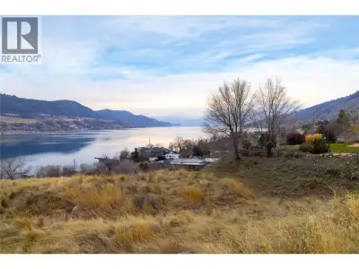 Experience prime Okanagan living on this extraordinary 0.245-acre south-facing lot where the views a...