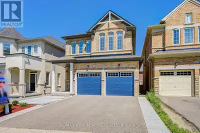 Welcome to this beautiful sun-filled detached home with the front door facing green space. This brig...