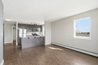 Amenities: In-suite Laundry • Security Cameras • Modern Appliances Suite & Building: One-bedroom and... (image 4)